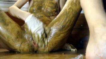 Enema play, fecal matter, spreading and immersing in gooey fluids with the scat woman in hardcore adult content.
